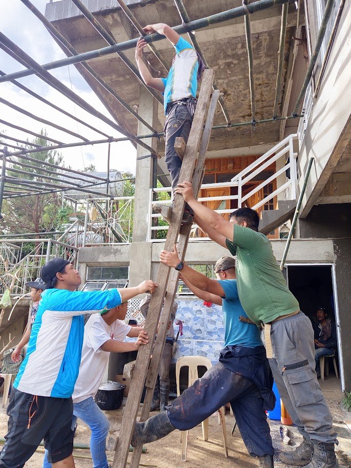 Community members constructing framework for Philippine celebration