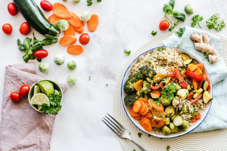 Vegan bowl with roasted vegetables, quinoa, broccoli, and carrots representing plant-based eating in the Philippines
