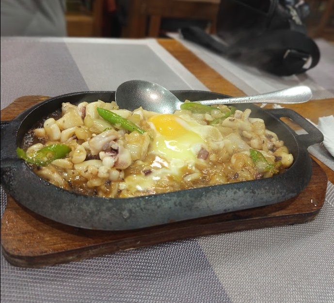 PH Sisig food for travelers 2026